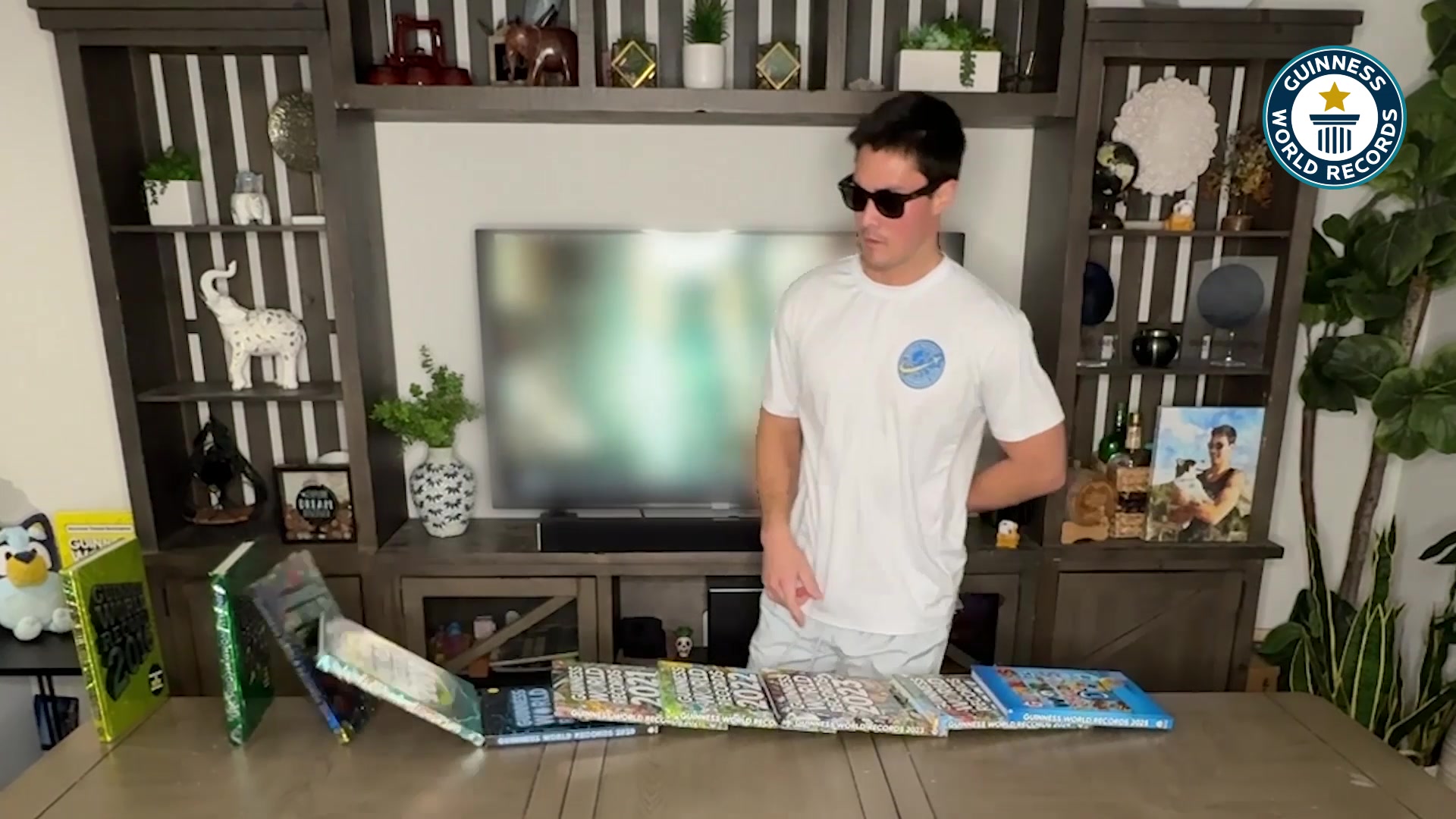 Video thumbnail for Johnny Cruz Buckingham's Fastest Time to Topple 10 Guinness World Records Books