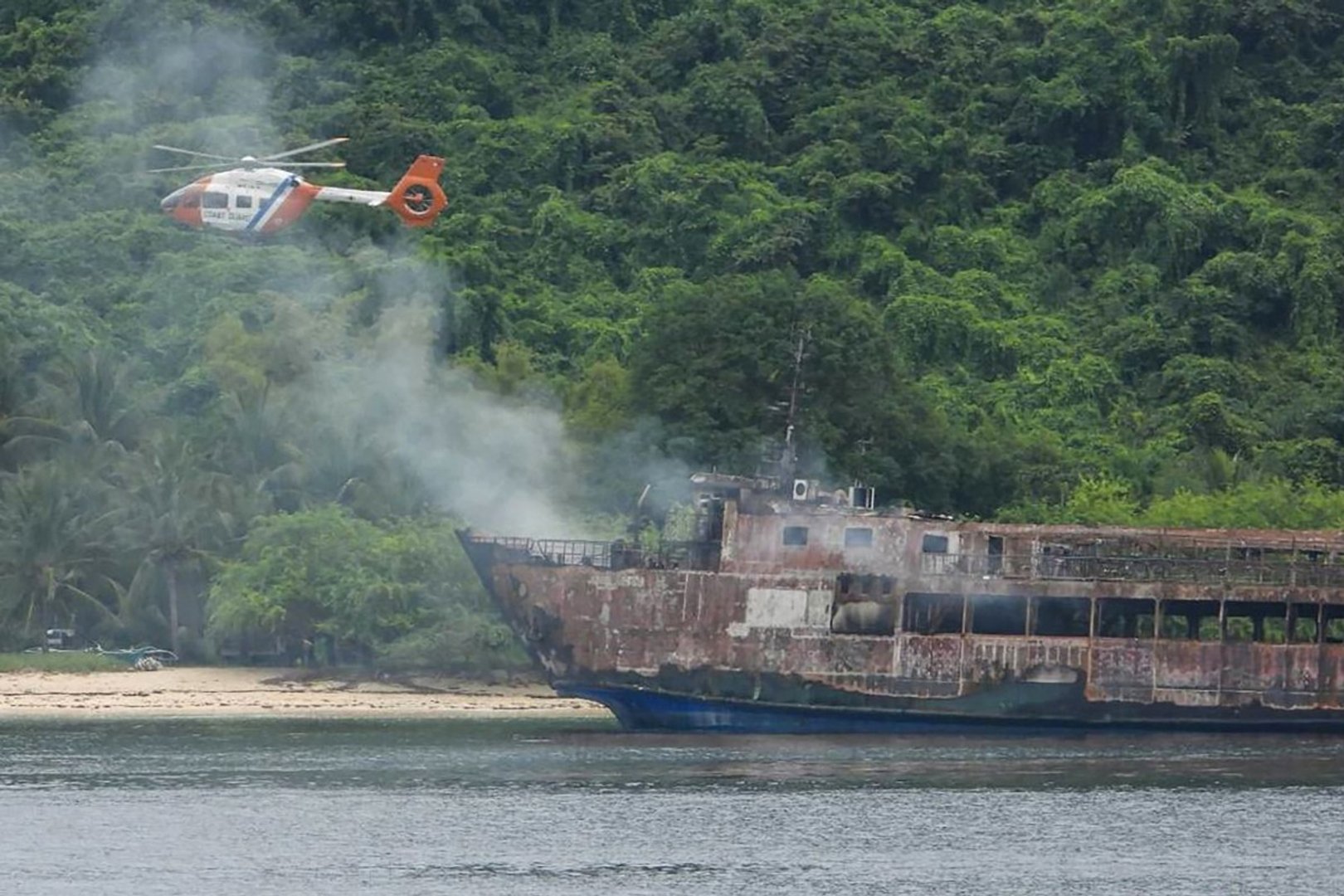 Video thumbnail for Philippines ferry fire: Over 80 missing after vessel burns off coast of Coron