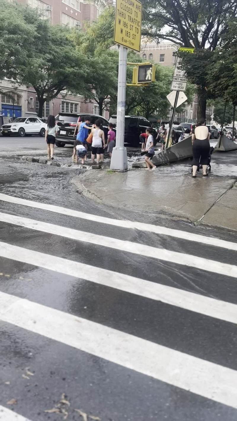 Video thumbnail for Kids Turning Washington Heights Street into Summer Water Park