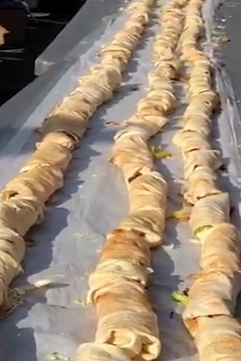 Video thumbnail for Longest line of shawarma wraps - 2,451 wraps by Shawarma Palace and shawarmafest.ca