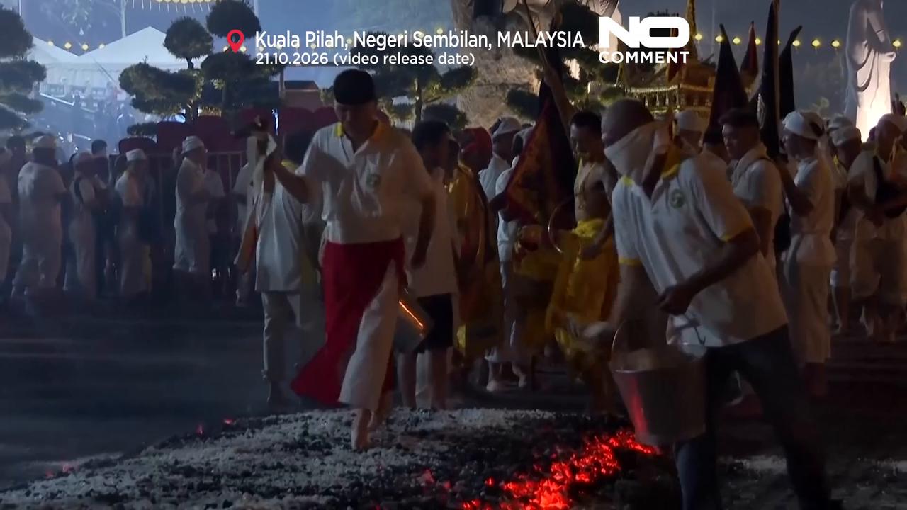 Video thumbnail for Nine Emperor Gods Festival: Devotees walk across burning embers for good luck