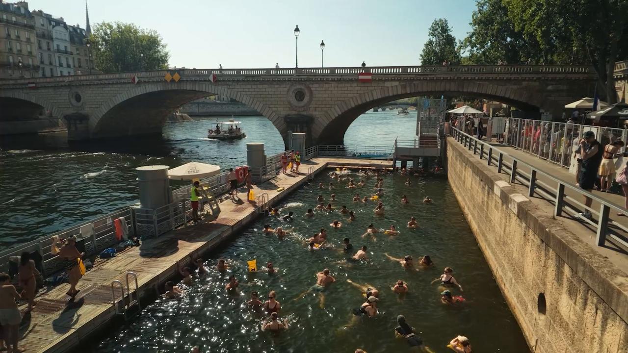 Video thumbnail for France: People swim at Bras Marie during Paris heatwave.