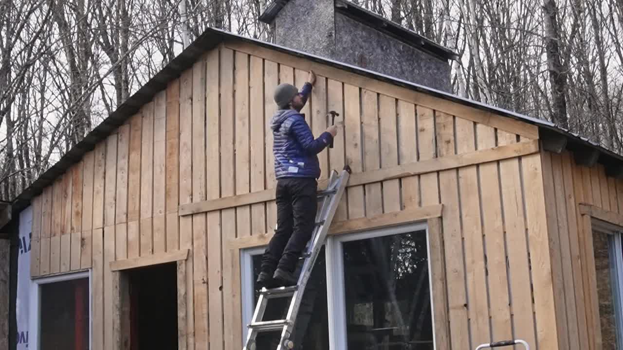 Video thumbnail for nick and maëla: board and batten siding! renovating our sugar shack, winter prep, door painting, and exterior design