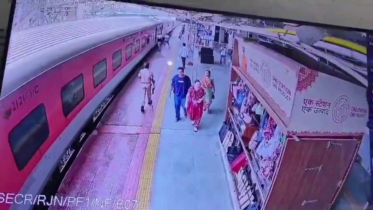 Video thumbnail for India: Swift action from official prevents tragedy as passenger slips from moving train.