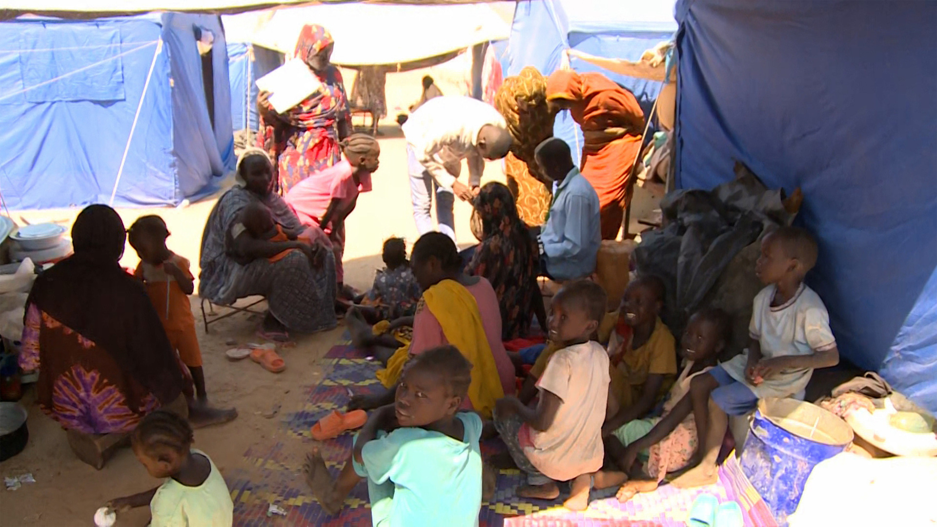 Video thumbnail for People sheltering at Sudan displacement camp say they ’pray for peace’