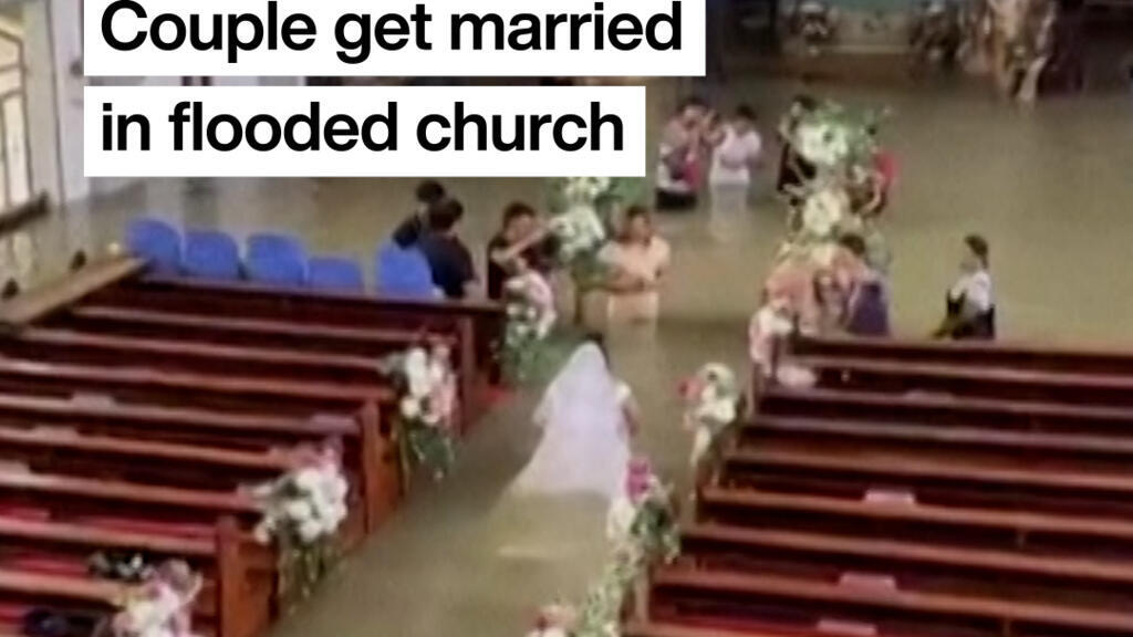 Video thumbnail for Philippine couple married in hip-deep floodwaters