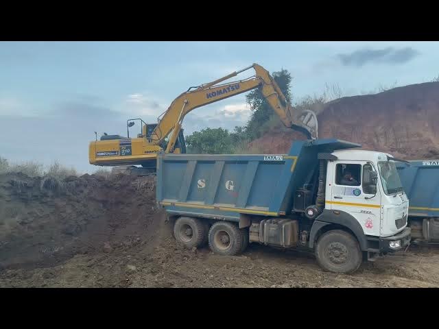 Video thumbnail for Komatsu PC210-10M0 2 Tippers loading