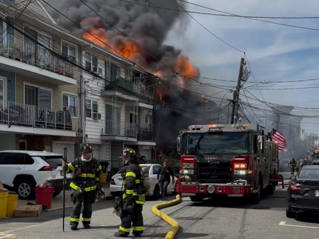 Video thumbnail for Neighbors say a fire in East Newark was started by explosion inside garage