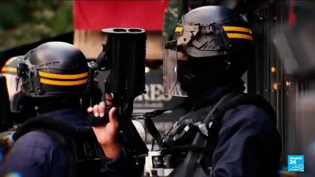 Video thumbnail for France suspends stun grenade use at student protests after pupil loses hand