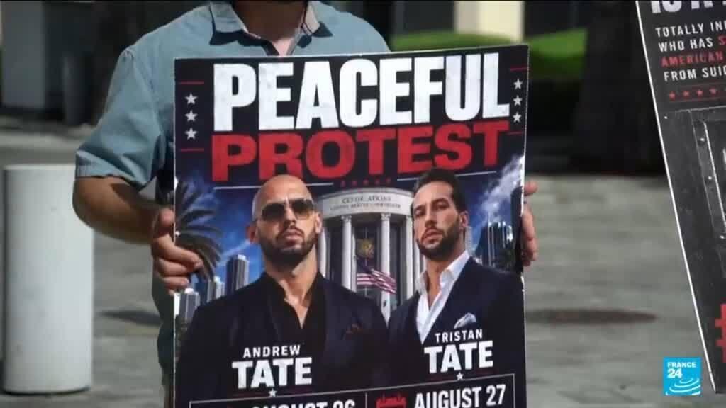 Video thumbnail for US : Tate brothers remain in jail as judge delays bail decision