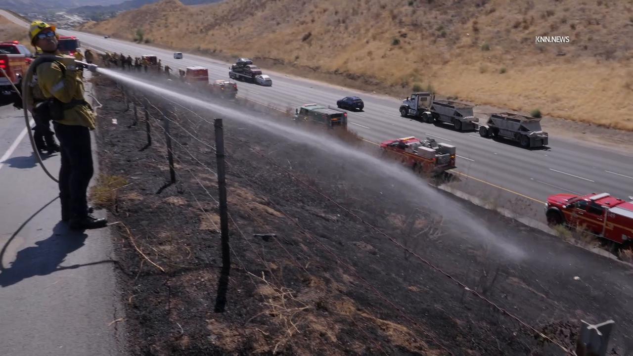 Video thumbnail for US, Los Angeles: Castaic Firefighters Battle Blaze Along 5 Freeway.