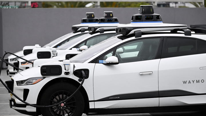 Video thumbnail for Waymo and Uber Hit Breaks on Robotaxis in Arizona