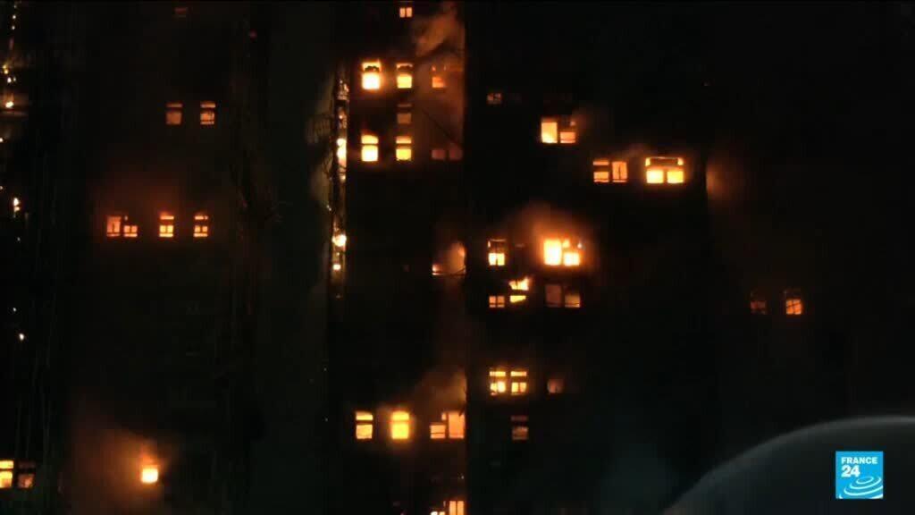 Video thumbnail for Fire engulfs Hong Kong residential blocks, killing at least 13