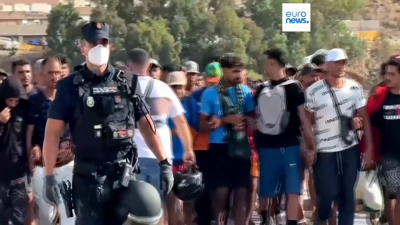 Video thumbnail for Spanish authorities begin relocating migrants from Ceuta beach to temporary shelters