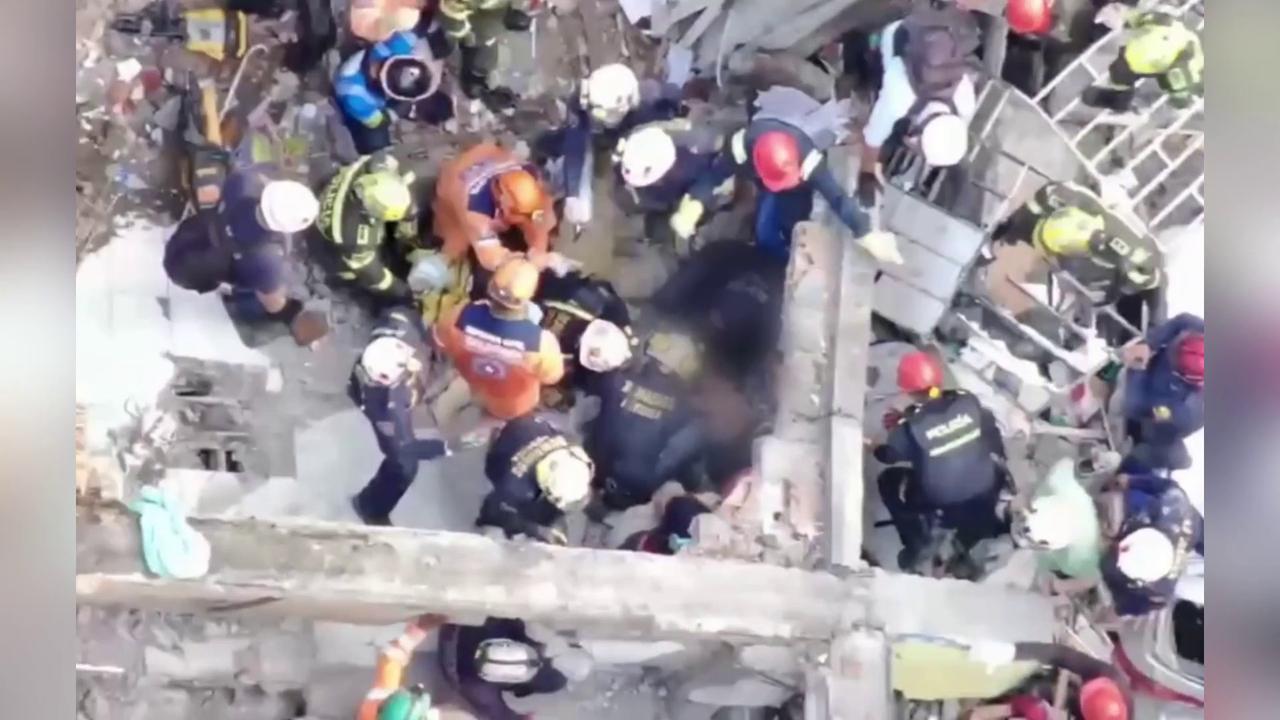 Video thumbnail for Colombia: Two People Rescued Alive From Collapsed Building In Pereira.
