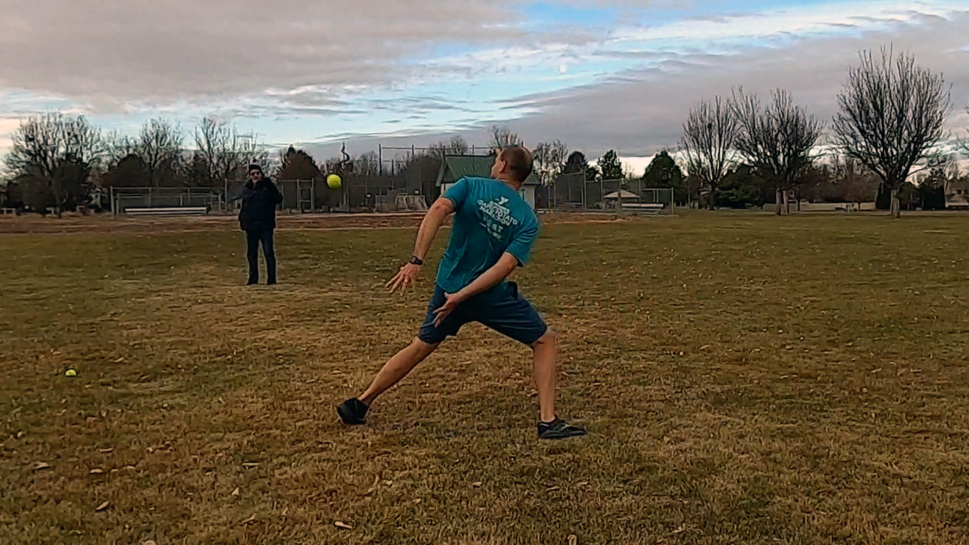 Farthest behind the back catch of a tennis ball  60.7 m (199 ft) by David Rush