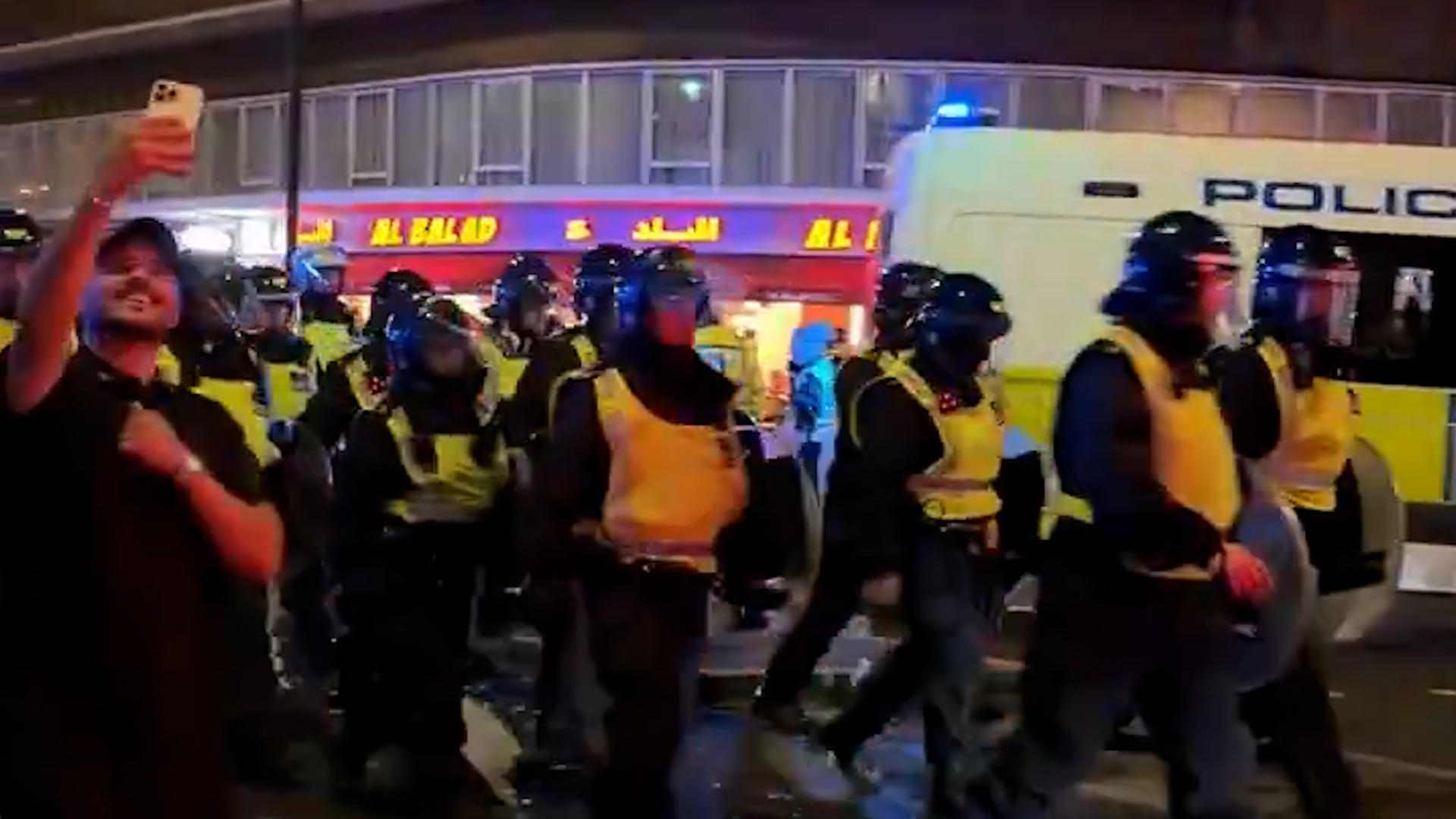 Video thumbnail for UK police confront Morocco fans over unrest after World Cup loss