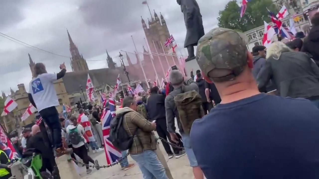 Video thumbnail for UK: Thousands Fill Parliament Square As Tommy Robinson Rally Floods Central London.