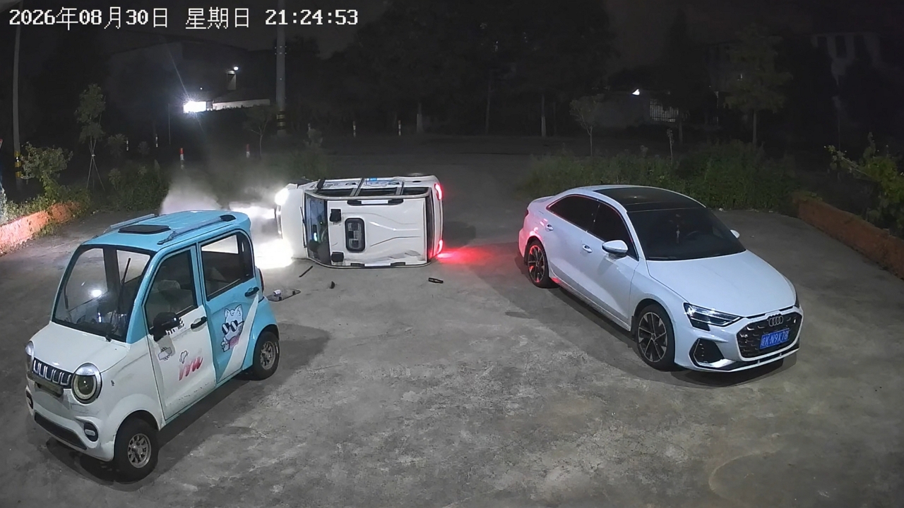 Video thumbnail for Mini Electric Car Tips Over After Hitting Gutter in Shanghai