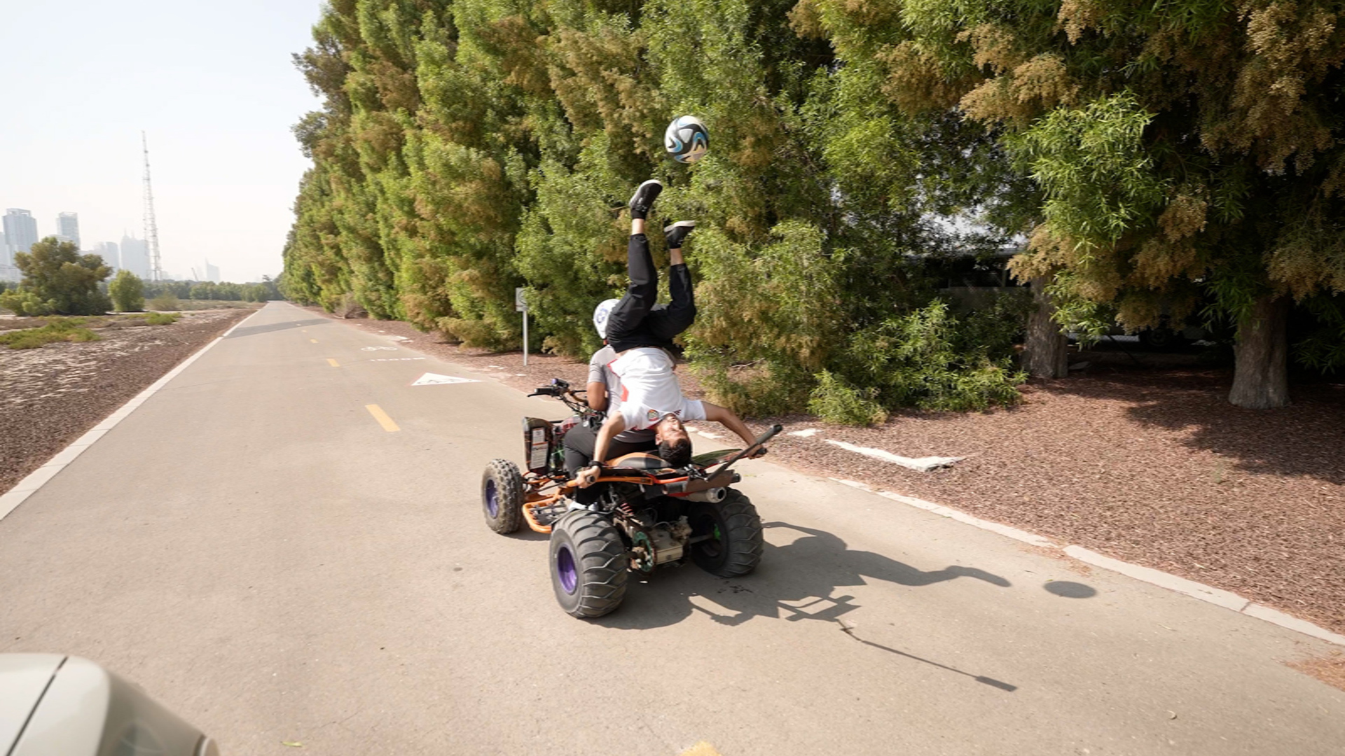 Most football sole touches on a moving quadbike in 30 seconds  23 by Ammar Ahmed Alkhudhiri and Abdulla Saeed Alhattawi