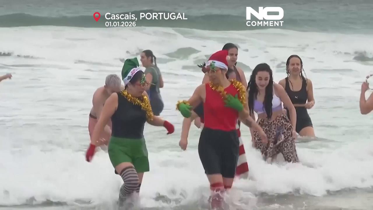 Video thumbnail for Swimmers brave traditional New Year’s sea dip at Carcavelos beach near Lisbon