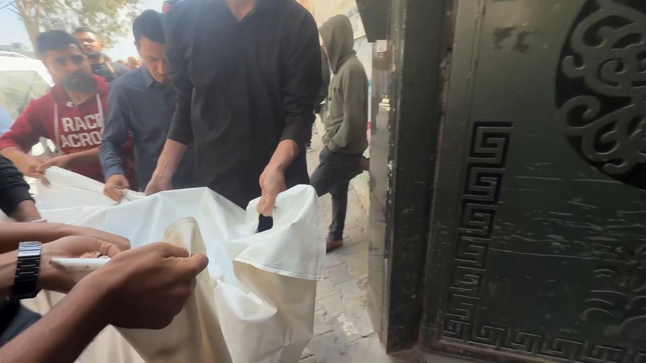 Video thumbnail for Gaza holds funeral for 7 killed in Israeli strike on Rimal neighborhood.