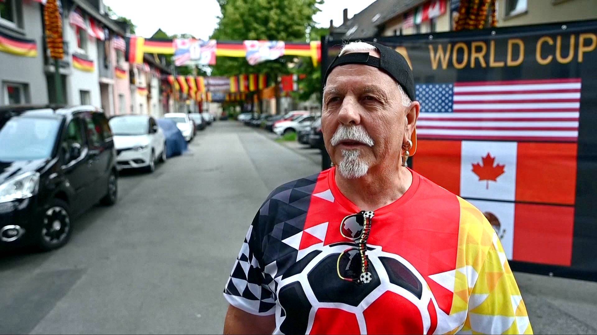 Video thumbnail for German superfan turns entire street into World Cup tribute in Essen