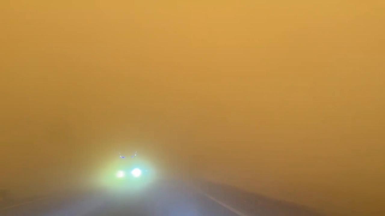 Video thumbnail for China: Driving straight through a massive sandstorm.