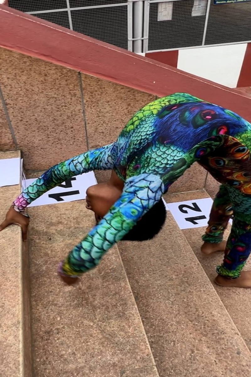 Video thumbnail for Fastest time to ascend and descend 15 stairs in a back bend position - 41.01 seconds by P K Saishriguru