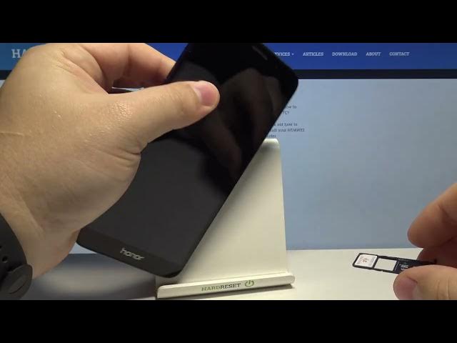 Video thumbnail for How to Insert SIM & SD Card on HUAWEI Honor 7C | SIM & SD Card Installation