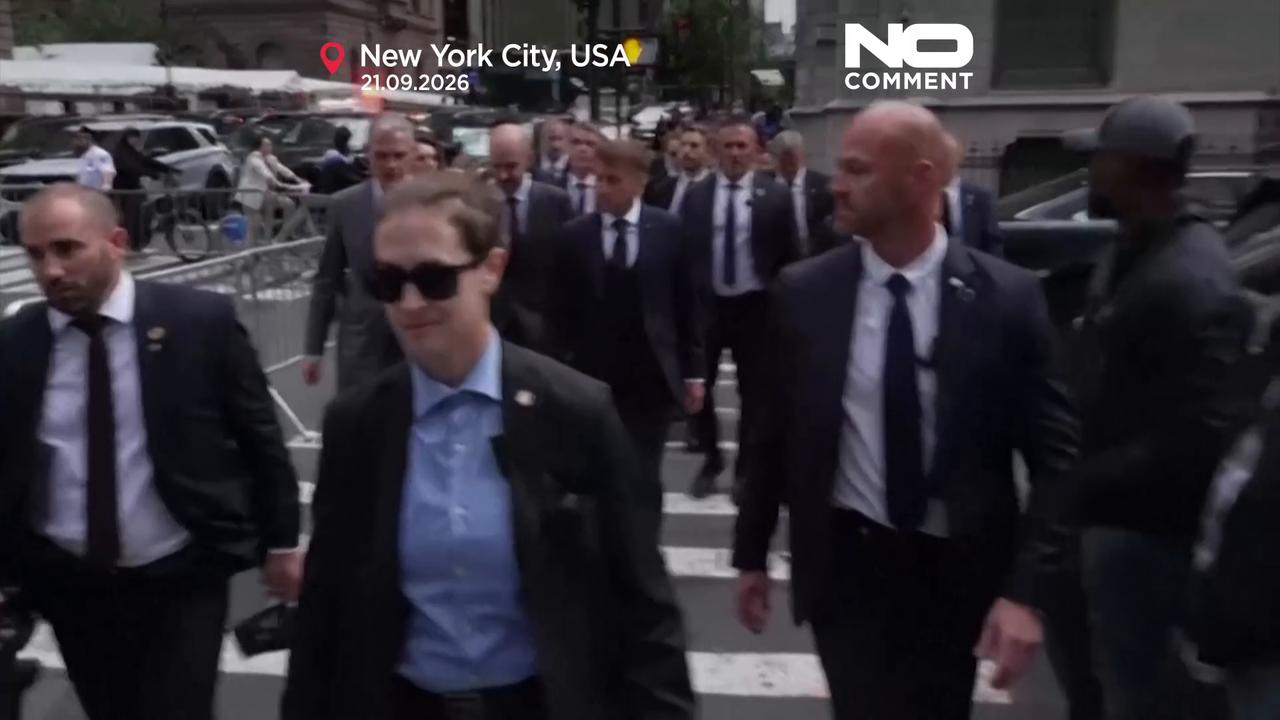 Video thumbnail for Macron walks through busy New York streets to Trump Tower