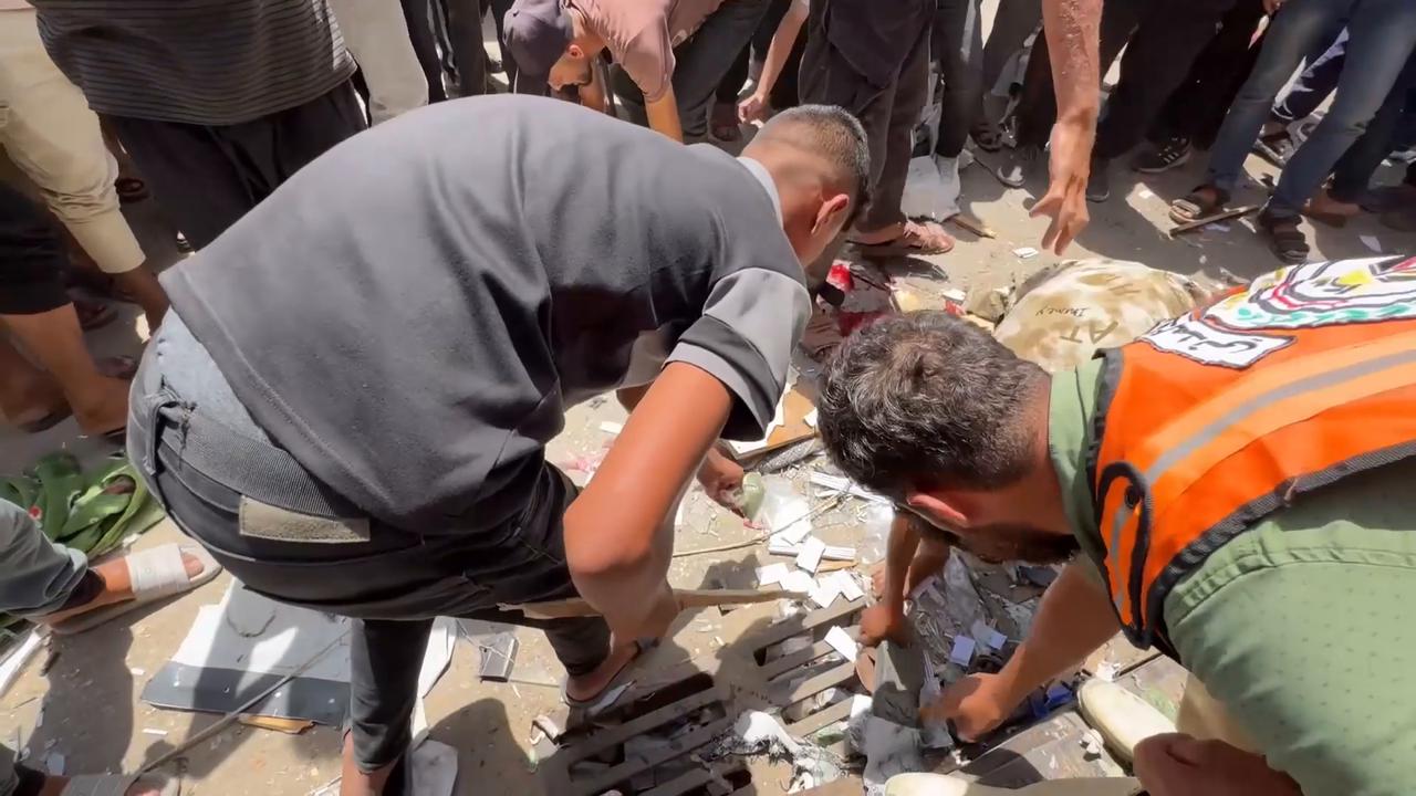 Video thumbnail for Israeli drone strike wounds 11 Palestinians outside Gaza hospital.