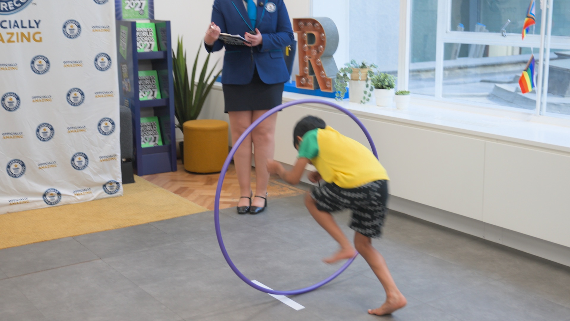 Video thumbnail for Most times to throw and go back through a backspinning hula hoop in 30 seconds (team of two) - 8 by Mamathi Vinoth and Bhairav Vinoth