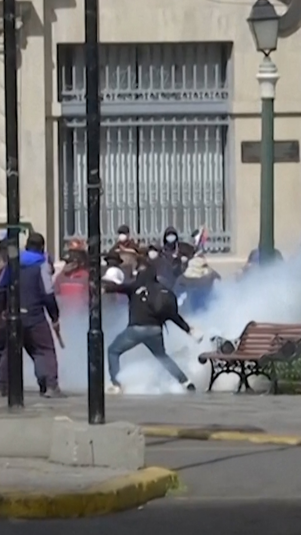 Video thumbnail for Bolivian miners clash with police demanding president resign
