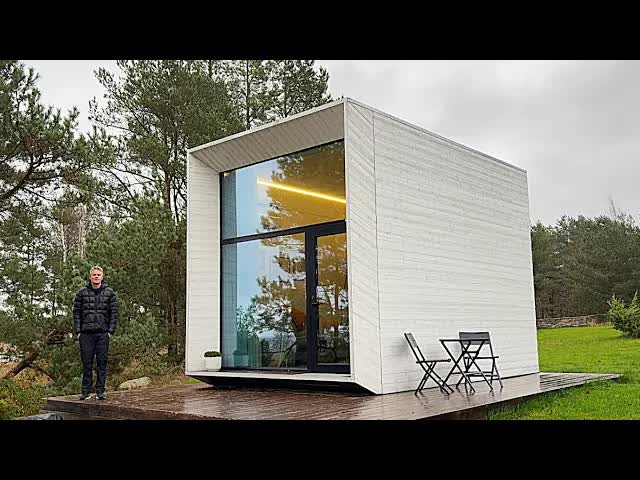 Video thumbnail for kerry tarnow: exploring a 200 sq ft koda micro home on the baltic sea: tiny home tour