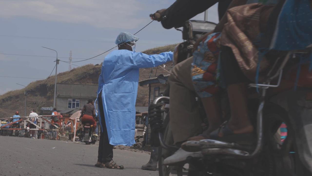 Video thumbnail for Democratic Republic of the Congo: Health workers carry out Ebola screenings near Goma in eastern DR Congo.