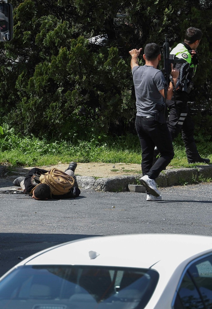 Video thumbnail for Figure seen on ground after shooting at Israeli consulate in Istanbul