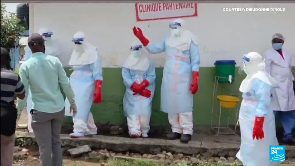 Video thumbnail for Congo protesters set fire to Ebola treatment tents in dispute over victim's body