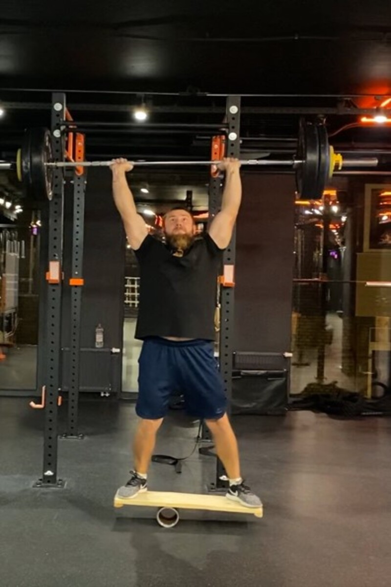 Video thumbnail for Heaviest weight lifted by barbell push press on a balance board  87.90 kg (193 lb 13 oz) by Dmytro Hrunskyi