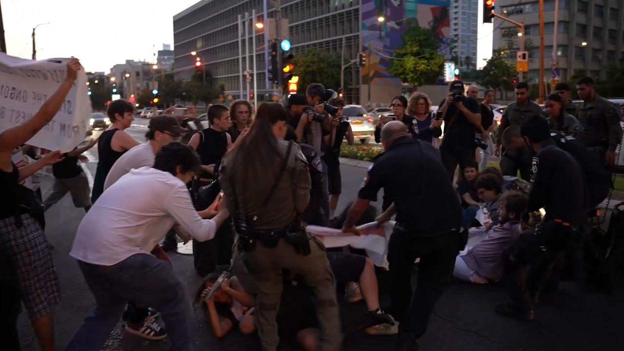 Video thumbnail for Israeli police detain protesters at pro-Palestinian rally in Tel Aviv.