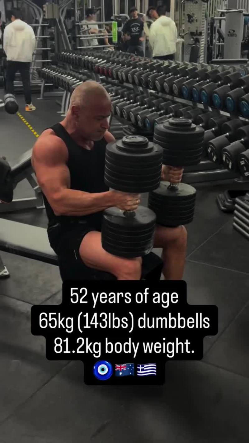 Video thumbnail for 52 Year Old Crushes 65kg Dumbbell Press as Gym Watches