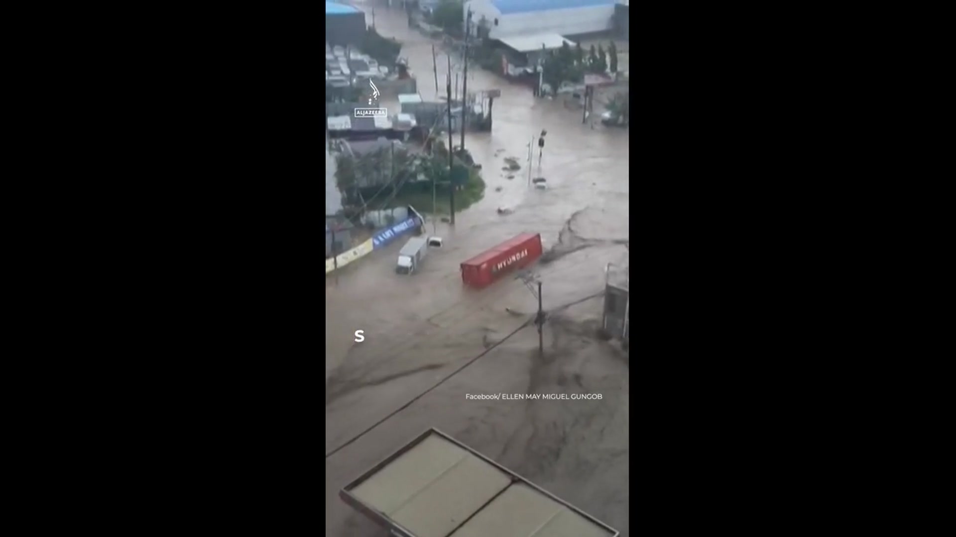 'Video thumbnail for Typhoon floods wash away containers and cars in Philippines'