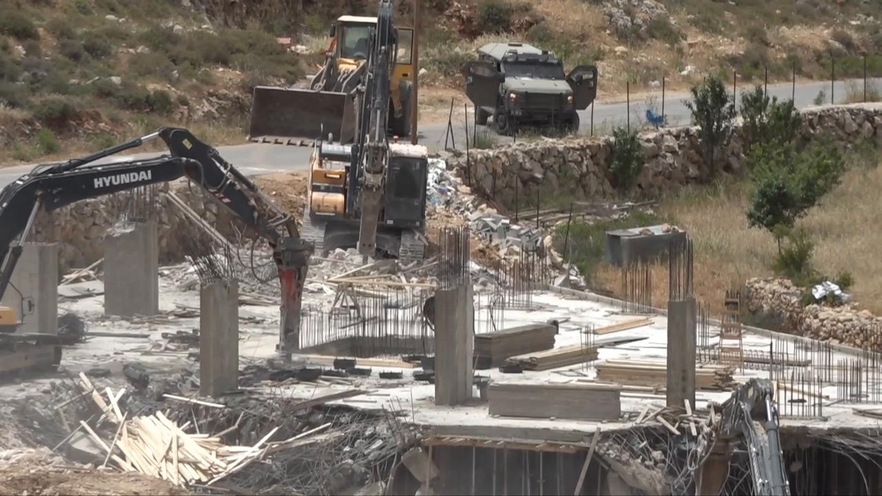 Video thumbnail for Israeli forces demolish building under construction in West Bank.