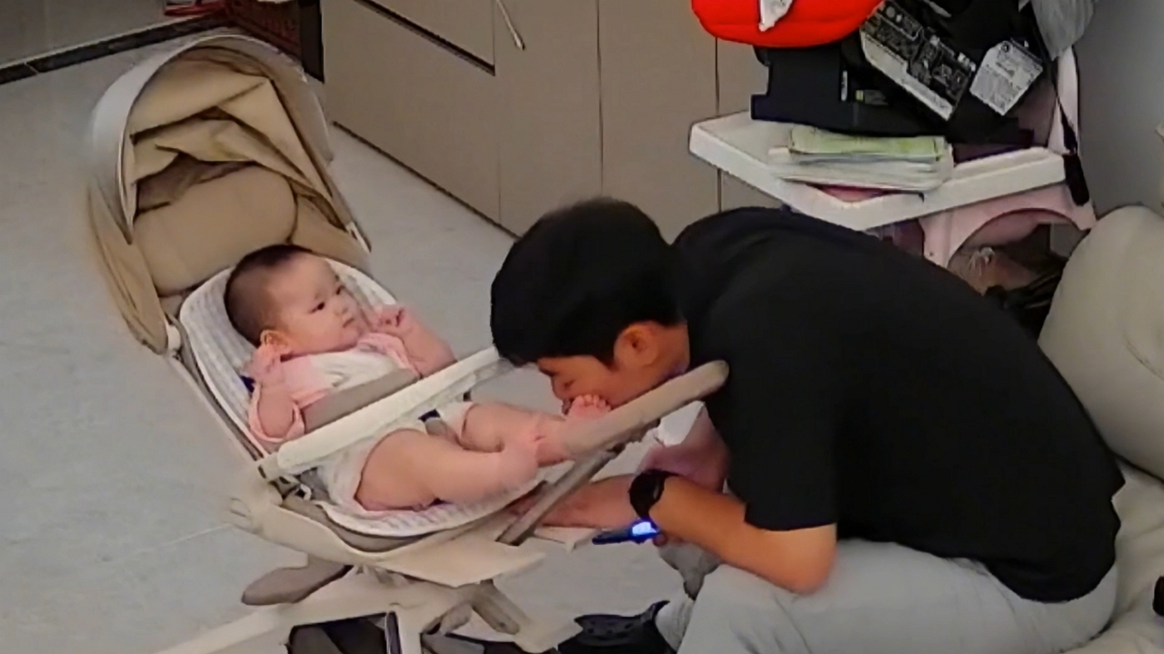 Video thumbnail for Baby Gently Kicks Dad's Face During Playtime in Guangdong