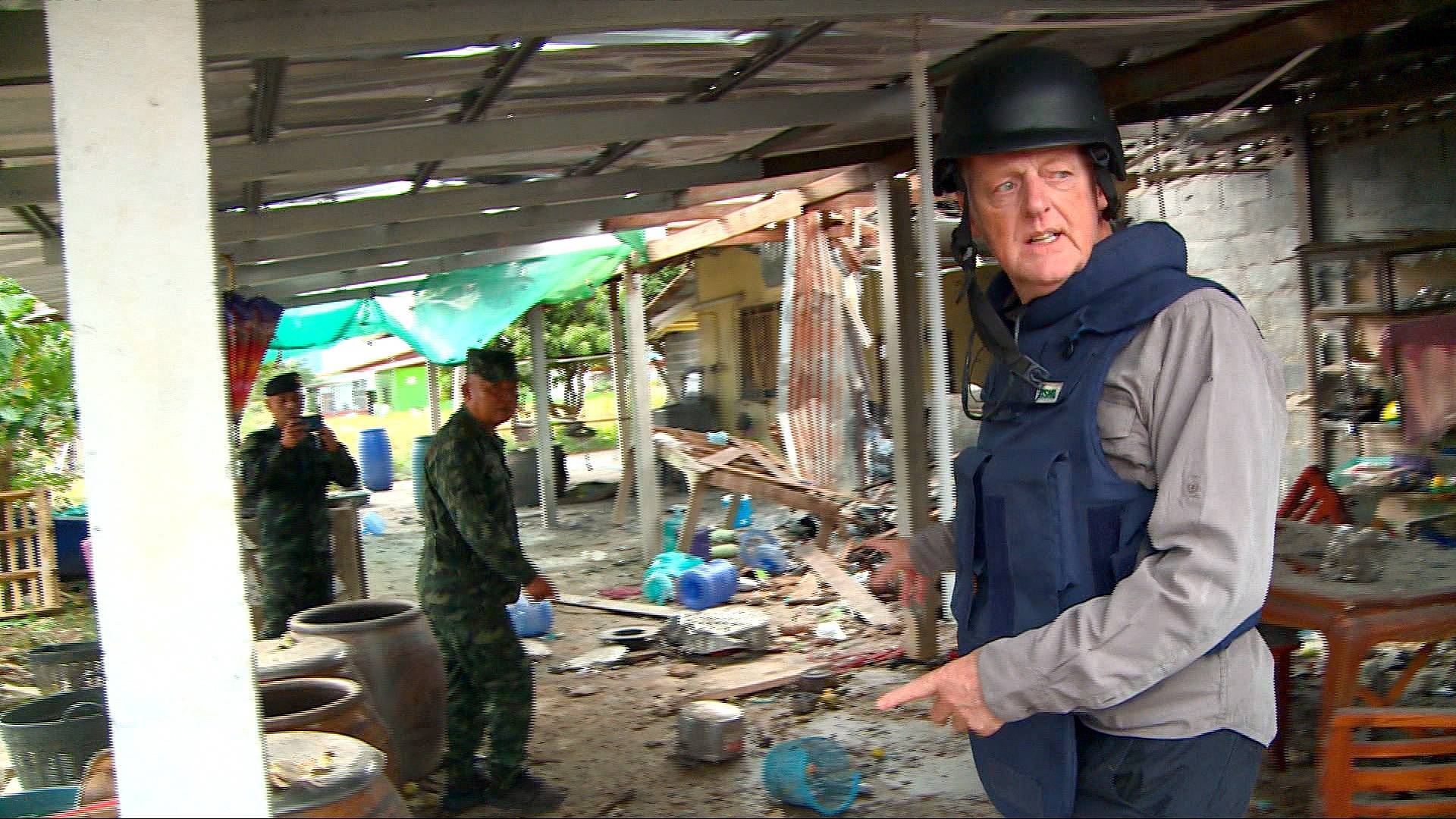 Video thumbnail for Thai military shows media border damage as new Cambodian rocket barrage hits