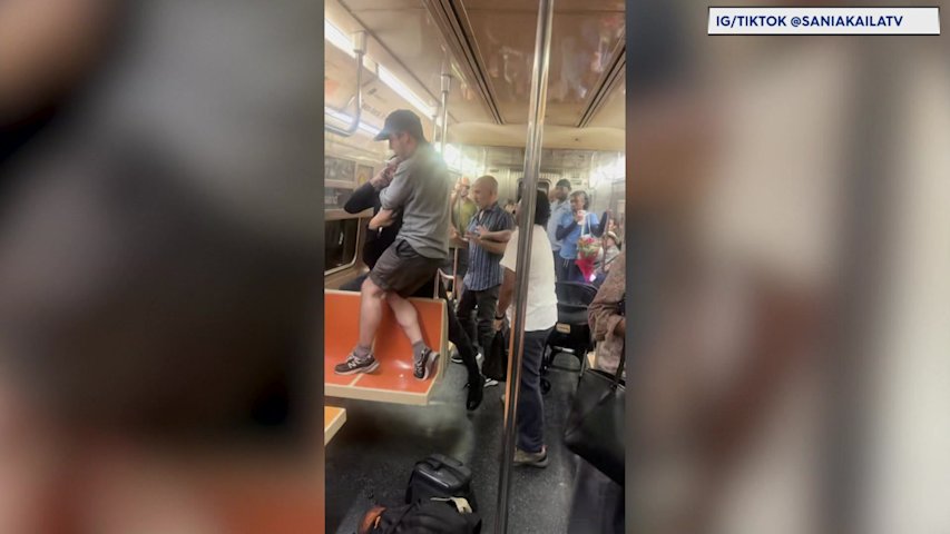Video thumbnail for Exclusive video captures moments after fist fight leads to slashing on Q train