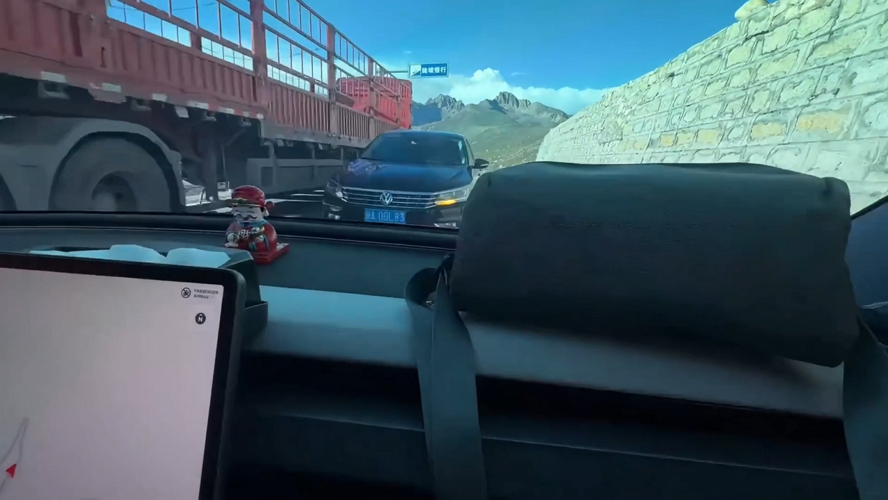 Video thumbnail for Close Call on Tibet’s Mountain Highway!