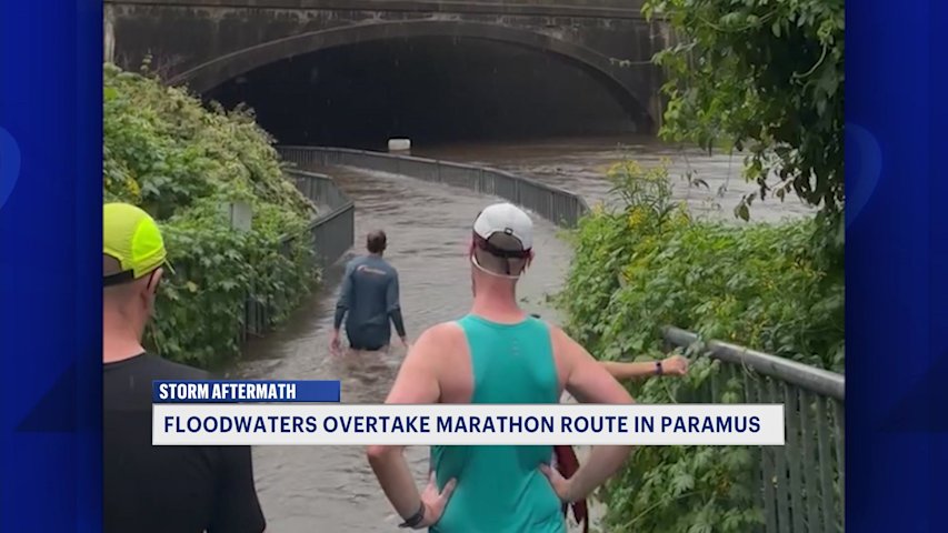 Video thumbnail for 'I had to hold myself to a rail.' Runners wade through waist-high floodwaters during Paramus half marathon