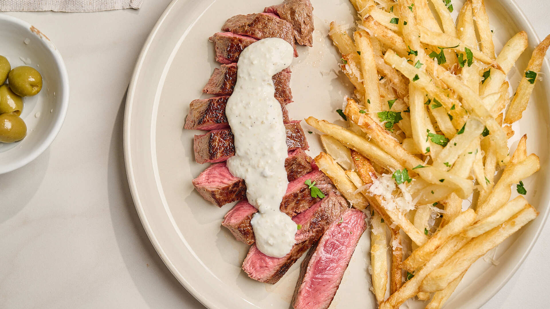 Video thumbnail for Dirty Martini-Inspired Steak Frites Recipe