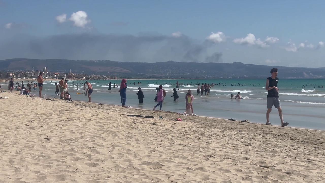 Video thumbnail for Lebanon: Busy Beaches in Tyre Amid Nearby Israeli Military Activity.